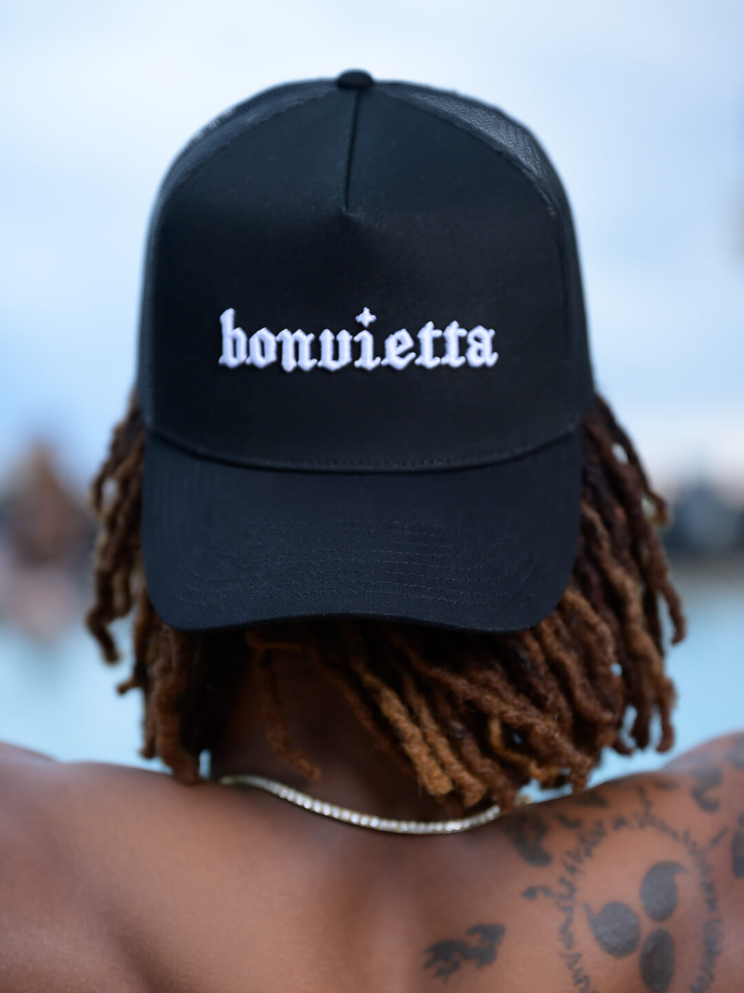 Bonvietta Trucker Logo Hat Homepage Image Styled On Model