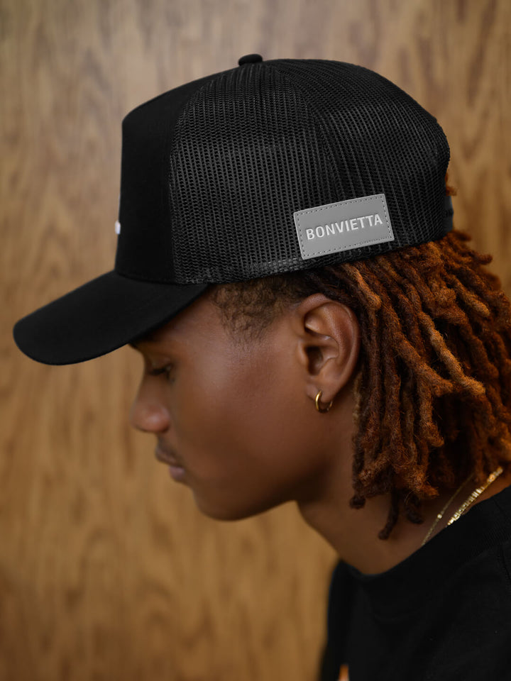 Bonvietta Ellipsis Trucker Hat Model Side View 2
