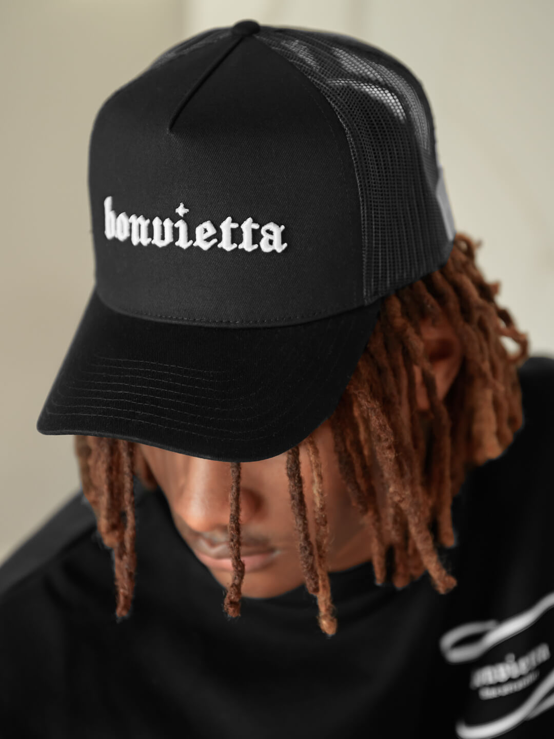 Bonvietta Logo Trucker Hat Model Front View